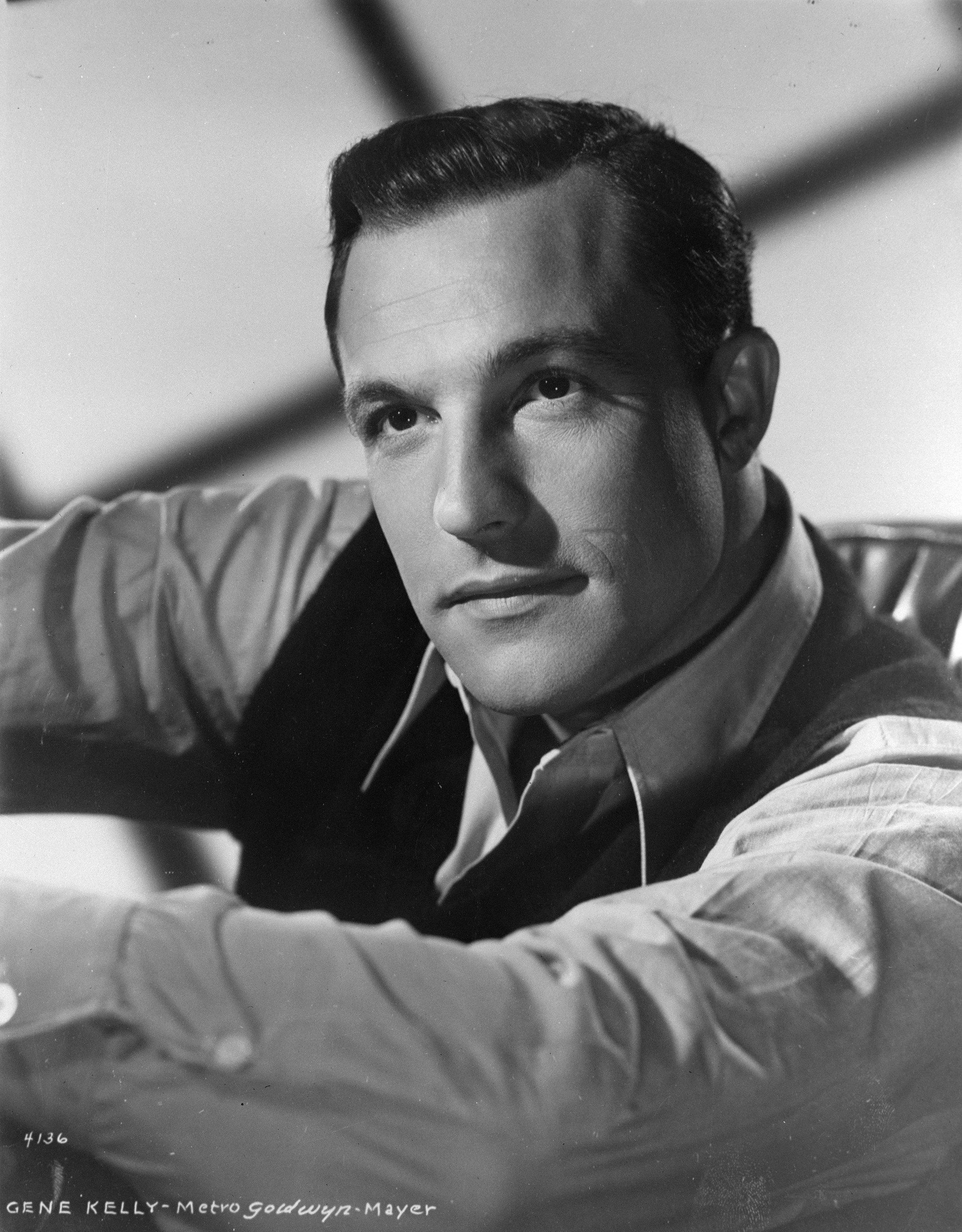 Gene Kelly in a classic Hollywood photograph, image 1