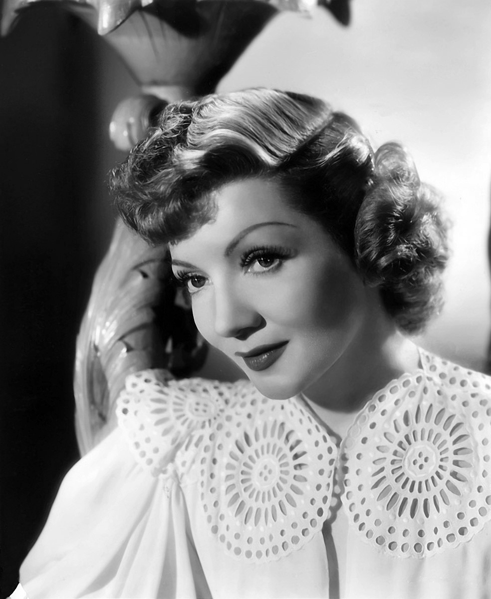 Portrait or film image of Claudette Colbert.