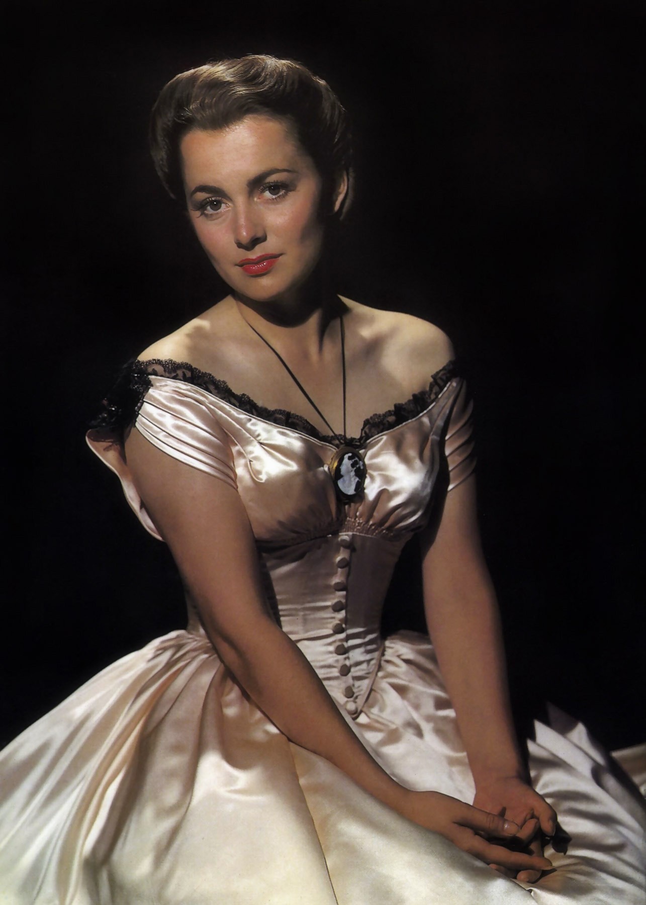 Portrait or film image of Olivia de Havilland.