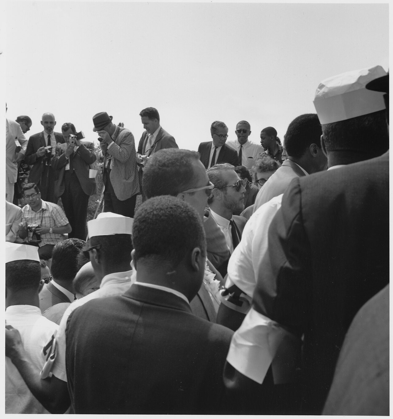 Paul Newman stands among a large crowd of civil-rights marchers and press photographers at the 1963 March on Washington.