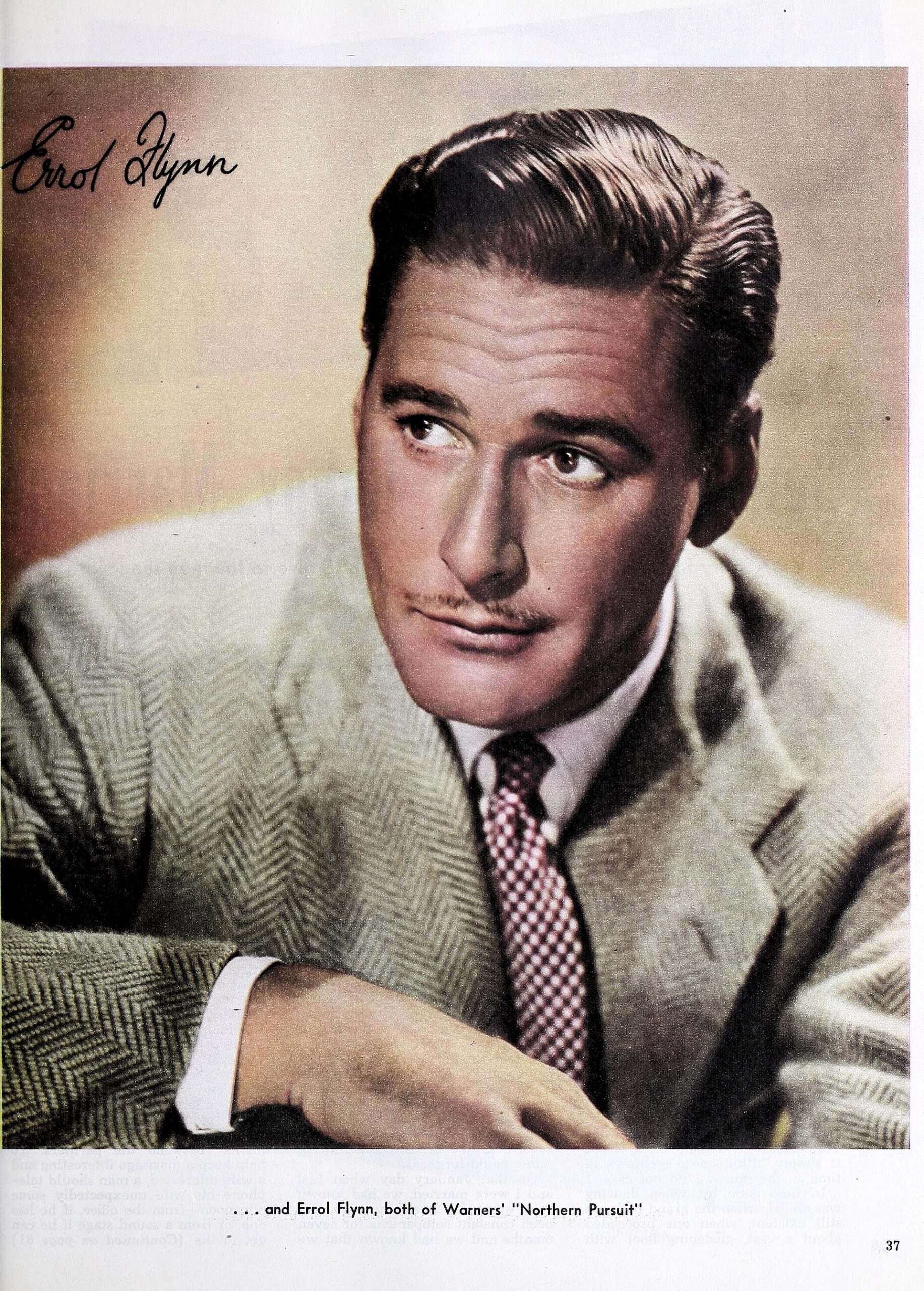 Errol Flynn poses in a dark jacket in a black-and-white studio portrait from 1944.