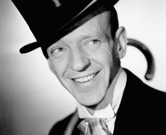 Black-and-white studio portrait of Fred Astaire in formal clothes in 1946.