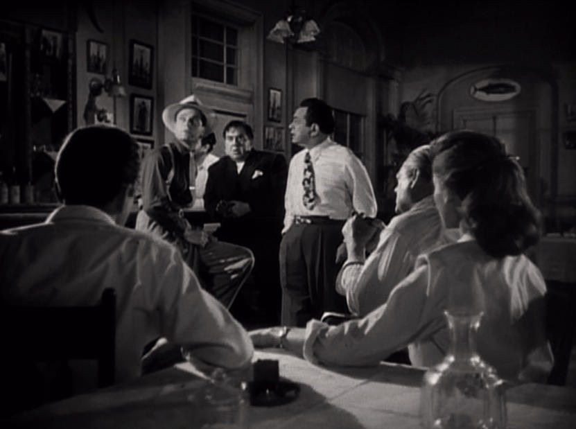 Humphrey Bogart and Lauren Bacall together in a black-and-white trailer image from Key Largo.
