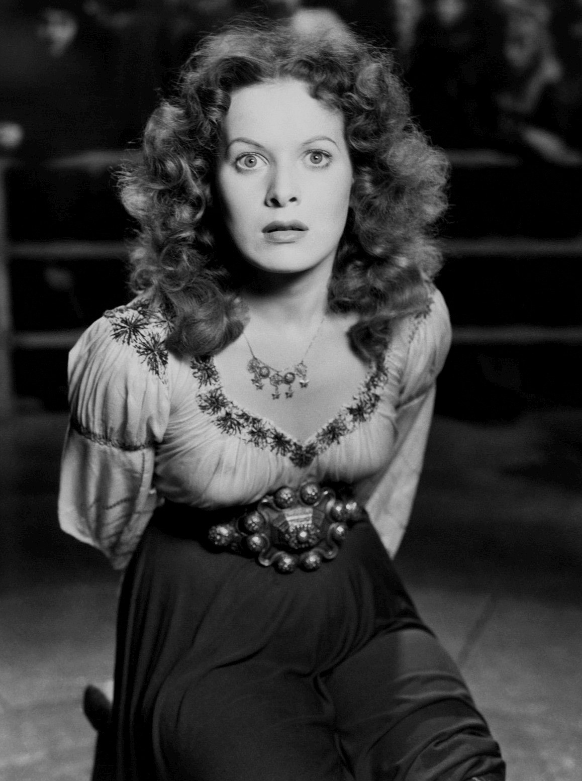 Young Maureen O’Hara wears period costume as Esmeralda in a publicity image for The Hunchback of Notre Dame.
