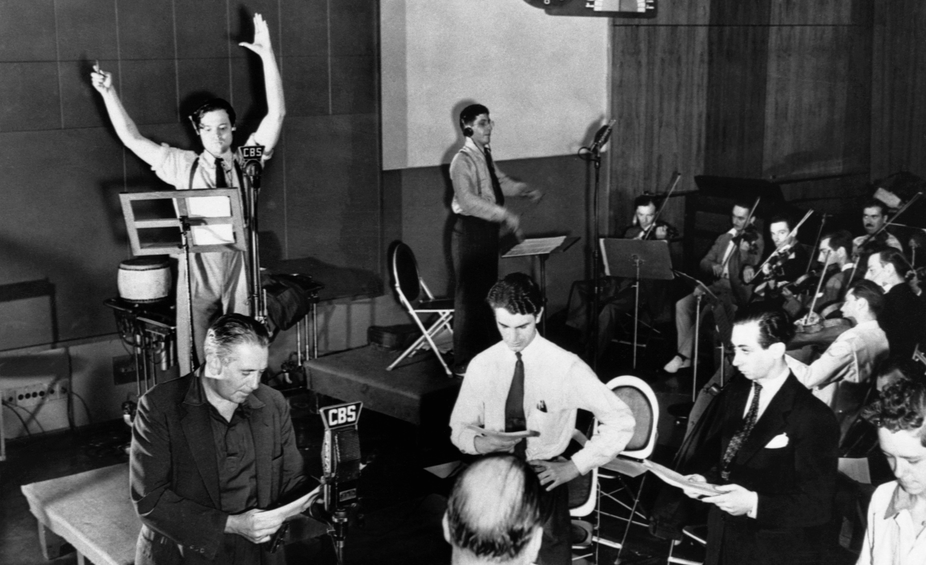 Orson Welles and the Mercury Theatre company rehearsing a CBS radio drama in 1938.