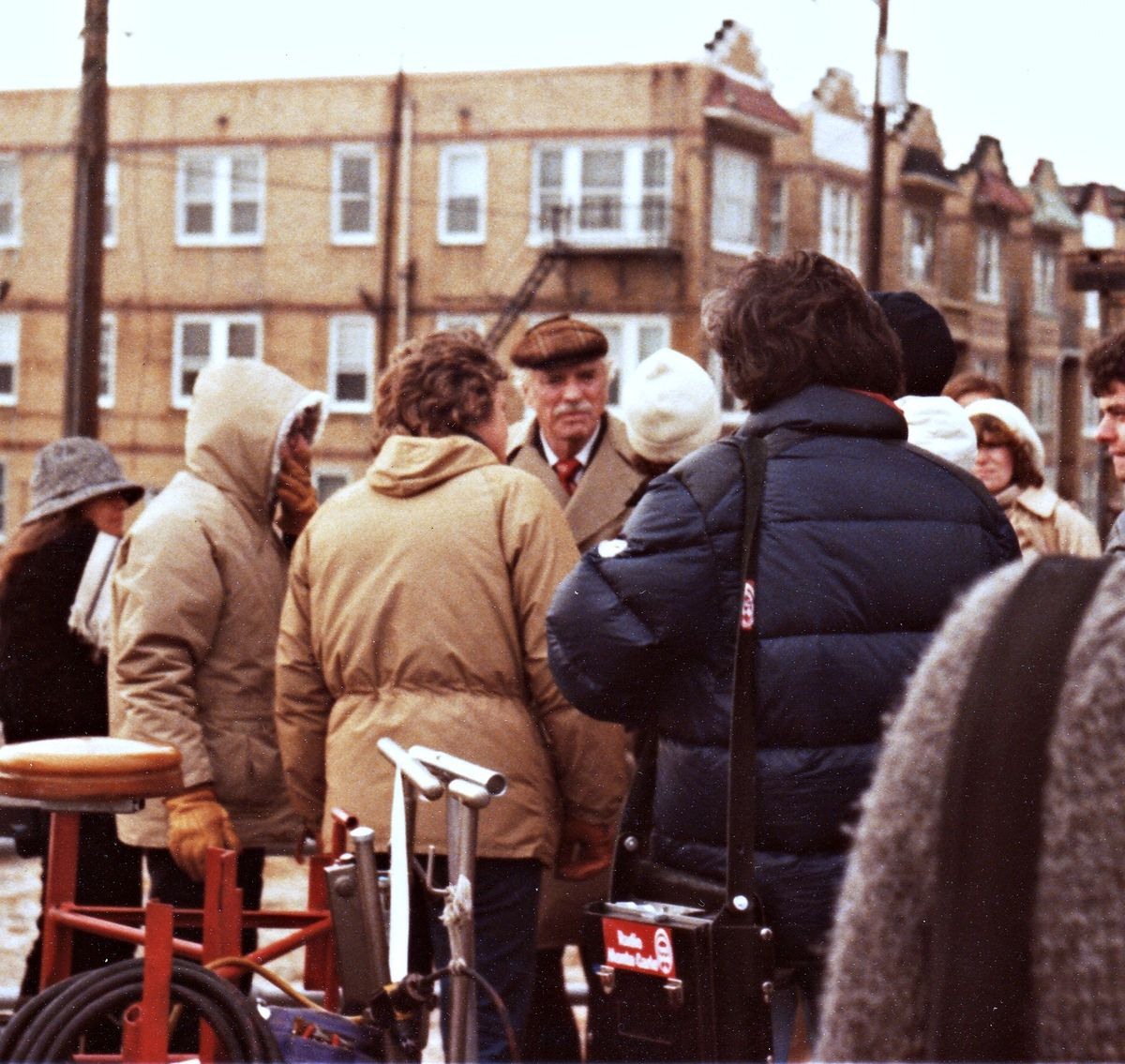 On set of movie Atlantic City. Director Louis Malle on left. 35mm.