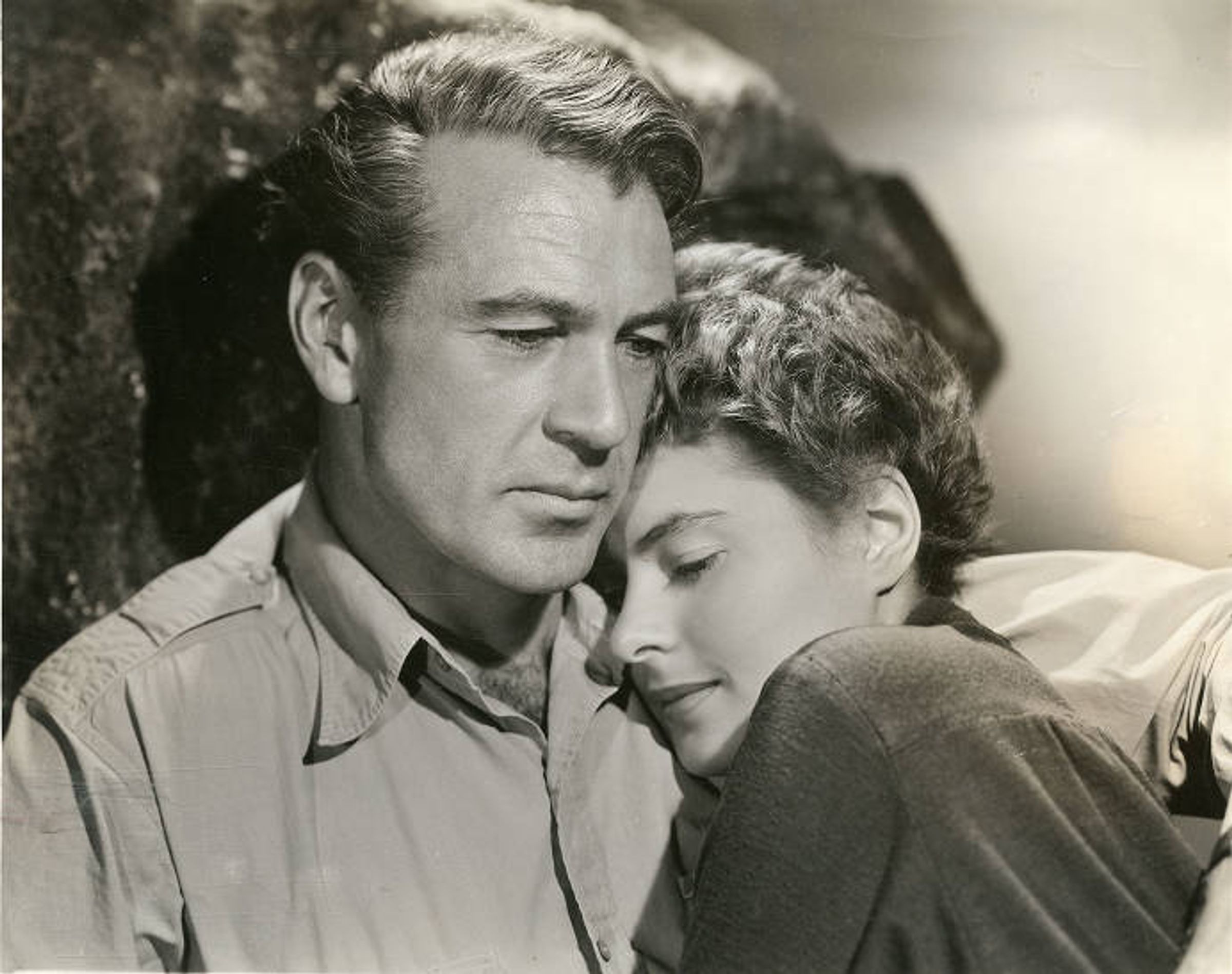 Gary Cooper and Ingrid Bergman in American epic war film For Whom the Bell Tolls (1943). Subjects: motion pictures, actors.