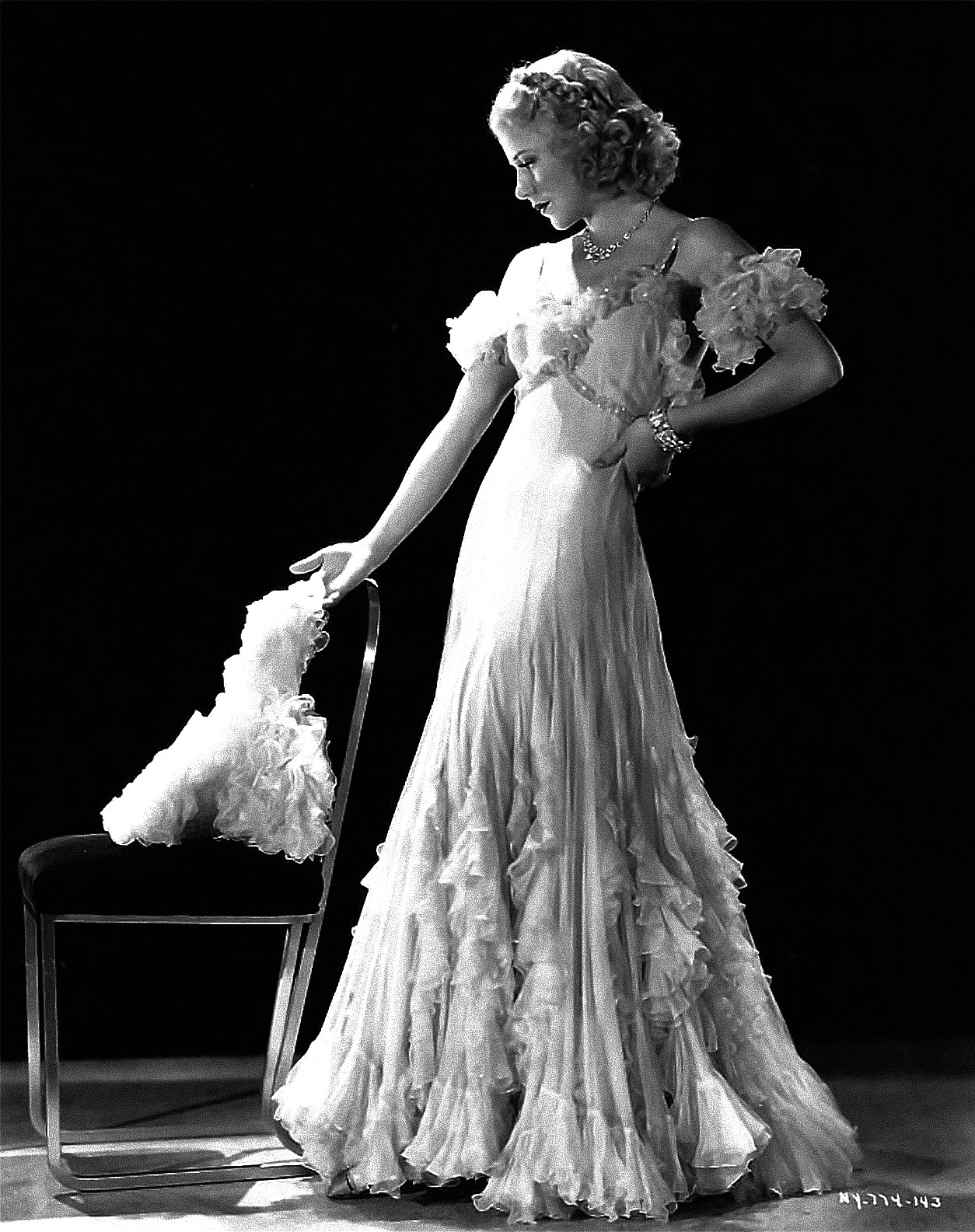 Ginger Rogers in a Walter Plunkett dress during filming of The Gay Divorcee (1934).