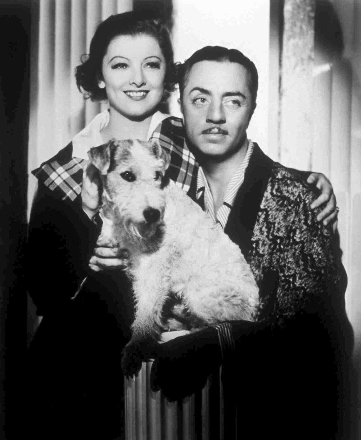 Promotional photograph for the film The Thin Man starring Myrna Loy and William Powell, with Skippy as Asta.